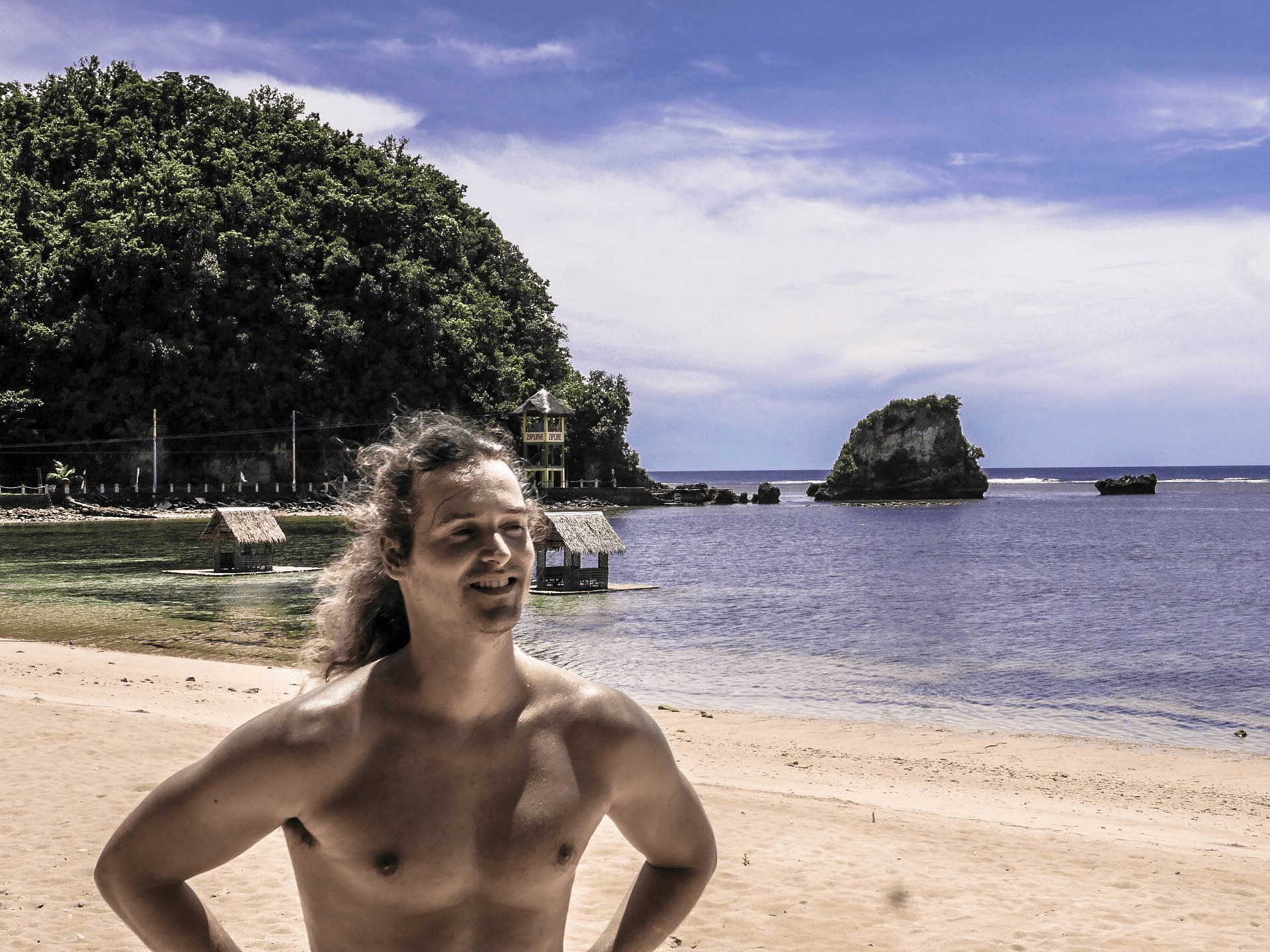 lennythroughparadise smiling and laughing on twin rock beach in catanduanes philippines